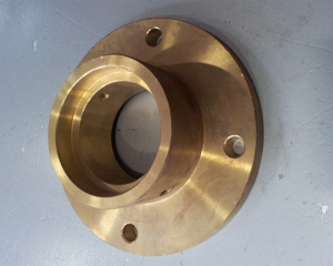 Coupling flange dry material medicator